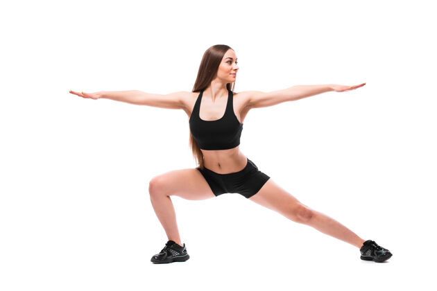 女孩运动型健康女性的肖像 穿着运动服锻炼身体 在白色背景上单独做运动瑜伽女人美容