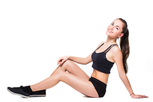 健康健身女做伸展运动隔离在白色背景运动训练模特
