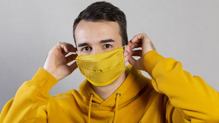 医学面罩脸上戴着医用口罩的人男性安全水平