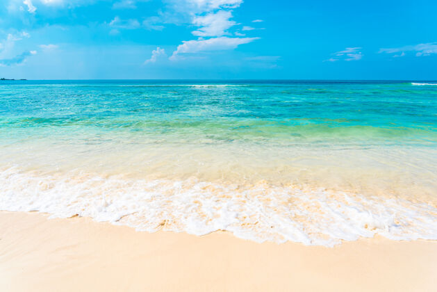 宁静美丽的热带空海滩海洋白云蓝天背景灵感海景炎热
