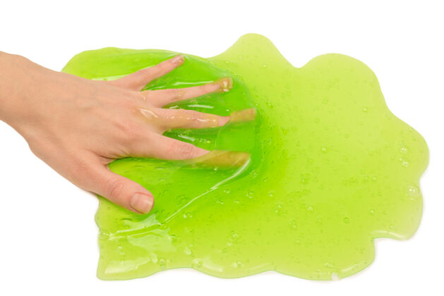 科学绿色粘液玩具在女人手上隔离在白色背景上手野生弹性
