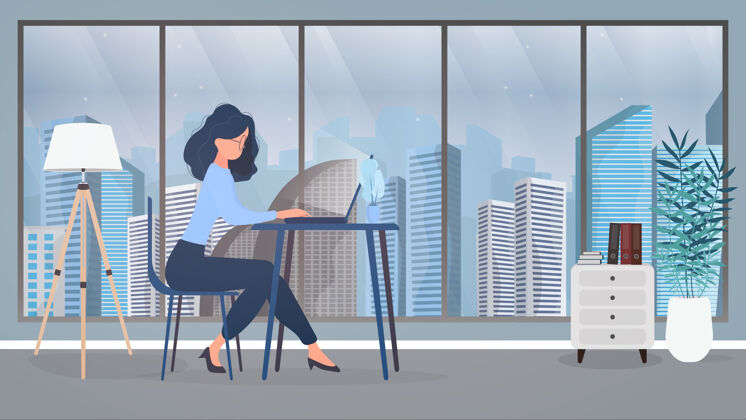 人物戴眼镜的女孩坐在教室的一张桌子旁办公室女孩工作在笔记本电脑找人工作的概念 查看职位空缺和简历男人快乐玻璃