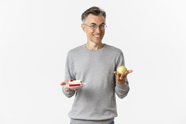 苹果帅气健康的中年眼镜男写真 推荐吃苹果健康成人男性