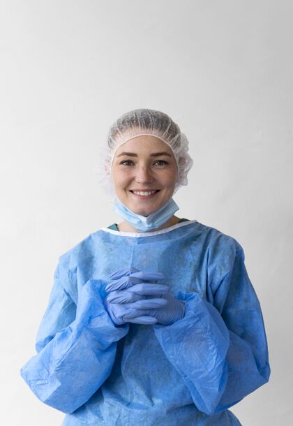 防护戴着医用防护设备和口罩的女人衣服个人防护用品健康