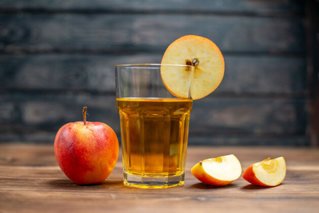 食品前视图新鲜的苹果汁与新鲜的深色饮料上的苹果照片颜色鸡尾酒水果柑橘健康新鲜