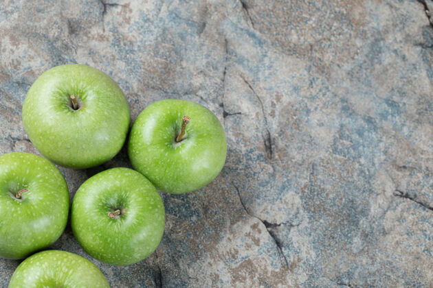 食物绿苹果被隔离在混凝土上蔬菜顶视图大理石