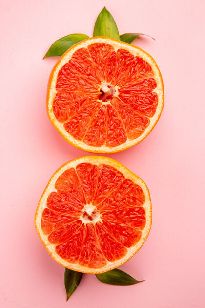 醇香粉红色表面上美味的葡萄柚水果片俯视图食品柑橘水果