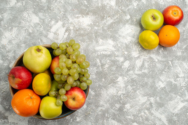 醇香顶视图水果成分葡萄 橘子和苹果 白色背景 成熟水果 维生素 醇厚 新鲜苹果顶部可食用的水果