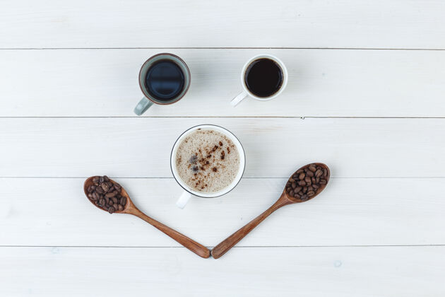 早晨顶视图咖啡杯咖啡豆木制背景水平新鲜的桌子咖啡