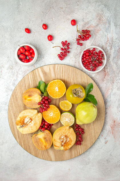 浆果顶视水果成分苹果梨等水果上白桌水果新鲜成熟成熟食用水果水果成分