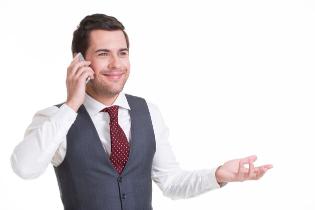 站立手机随手打电话的快乐男人画像概念交流通话帅哥成人
