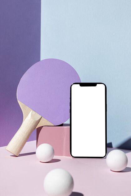 乒乓球乒乓球和用智能手机划桨的前视图消遣手机静物