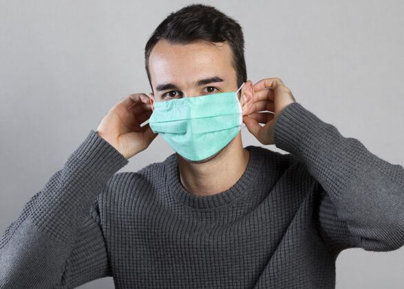流行病戴上医用面罩的人的正面图病毒人水平