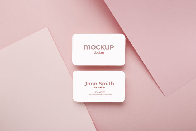 身份极简主义的名片模型上的粉红色和白色的几何背景组成品牌商务模型商务