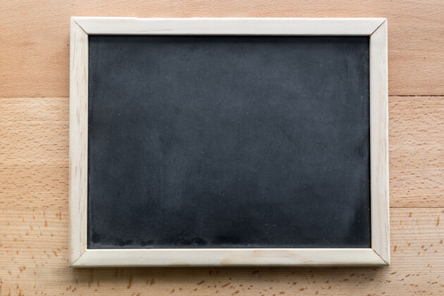 绘图水平拍摄的空黑板躺在木制背景上信息教育黑板