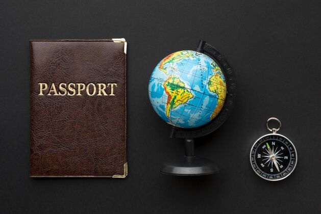 护照顶视图护照和指南针安排平面旅游地球仪